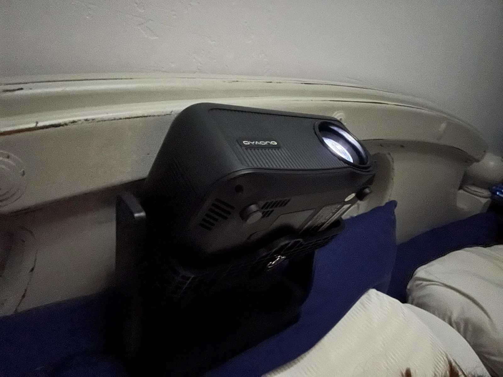 Buyer photo of the AY3 projecting toward a ceiling